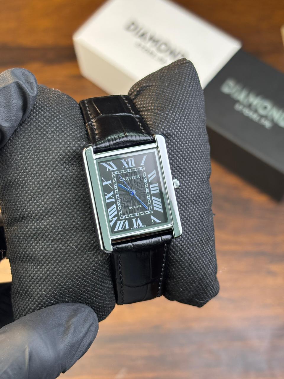 CARTIER STRAP WATCH WITH BLACK DIAL